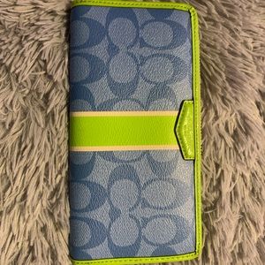 Coach signature wallet- 8”x4”inches.